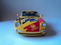 1:18 Bburago Porsche 911 (993) Carrera Racing Shell #1 1993 Amarillo. Subida por Francisco